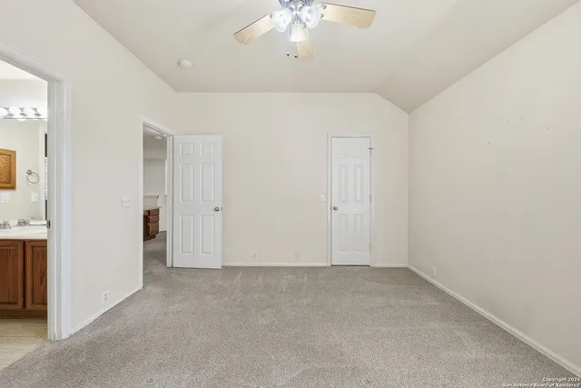an empty room with a bathroom