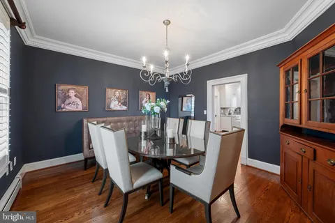 a bathroom with a shower and a glass door