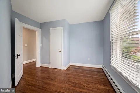 a view of deck with wooden floor and fence
