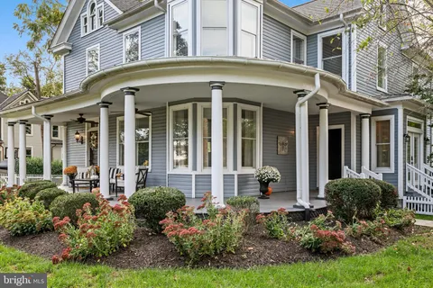 a view of front door and potted plants