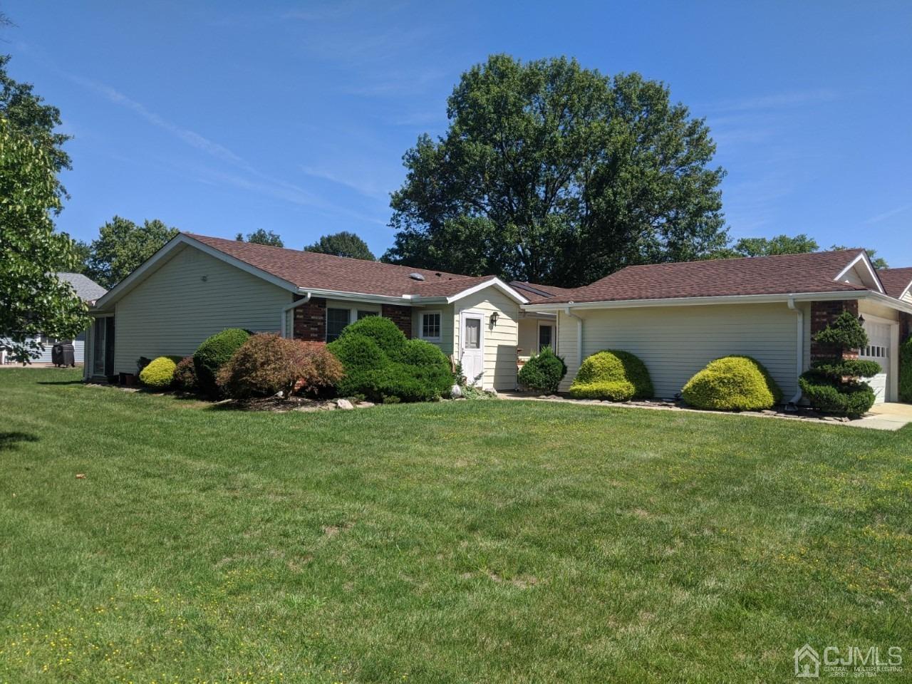 230 Convent Road, Unit A Monroe Township, NJ 08831 - Photo 2 of 22 a view of a house with a back yard