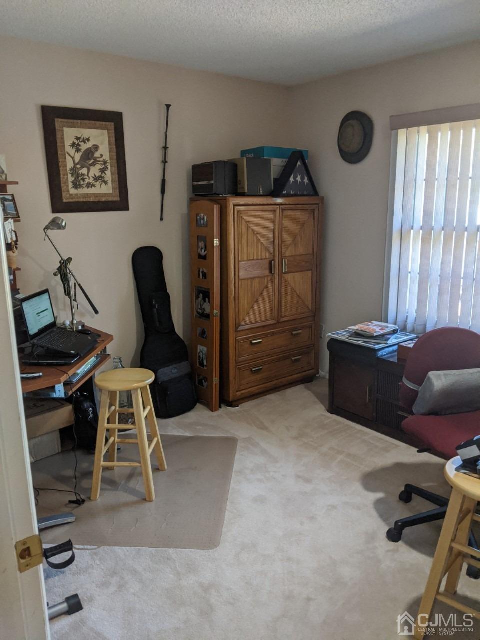 230 Convent Road, Unit A Monroe Township, NJ 08831 - Photo 15 of 22 a livingroom with workspace and a window