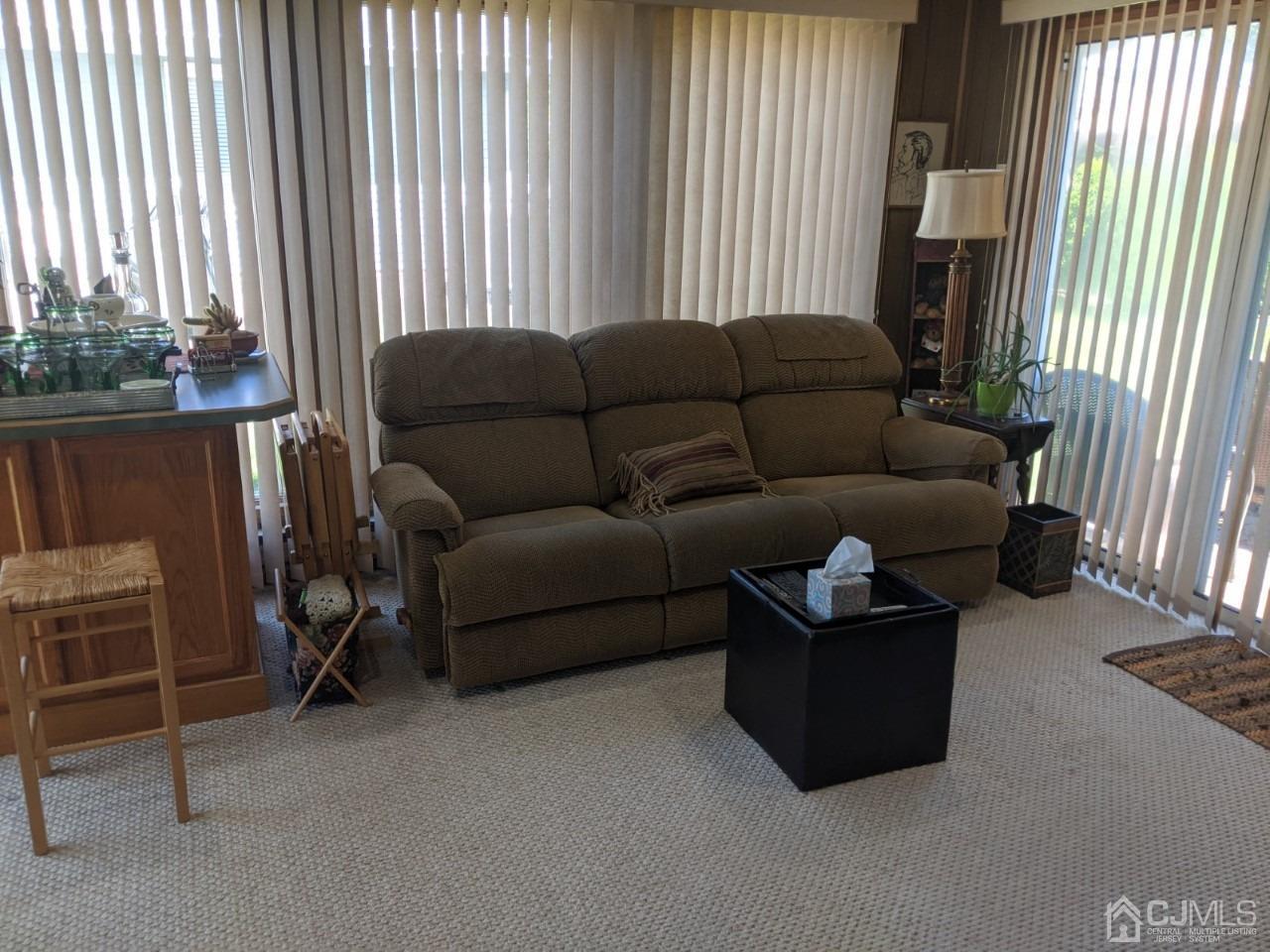 230 Convent Road, Unit A Monroe Township, NJ 08831 - Photo 8 of 22 a living room with furniture and a window