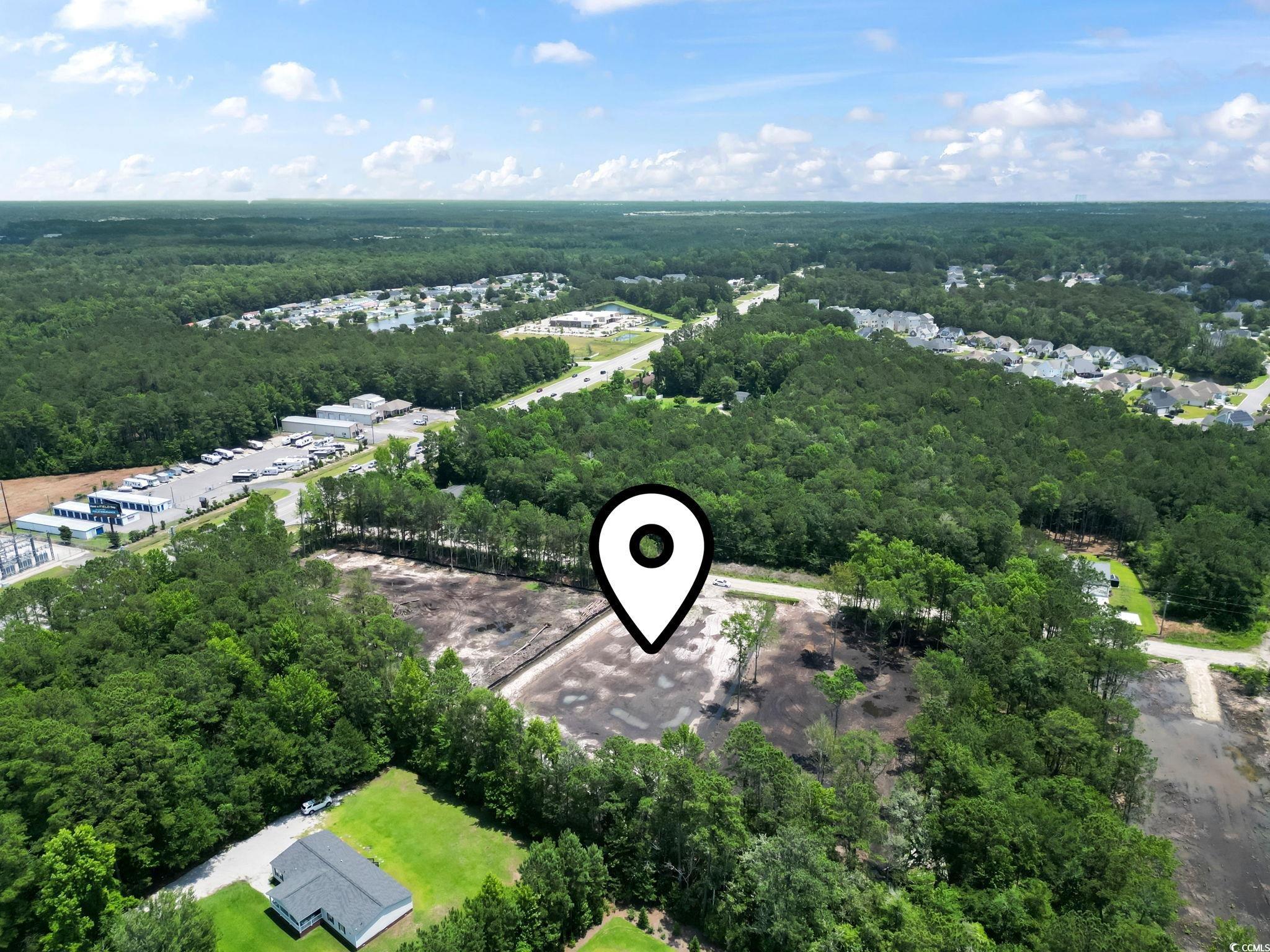 116 Dave Carr Court Myrtle Beach, SC 29588 - Photo 6 of 9 Aerial view of a heavily wooded area