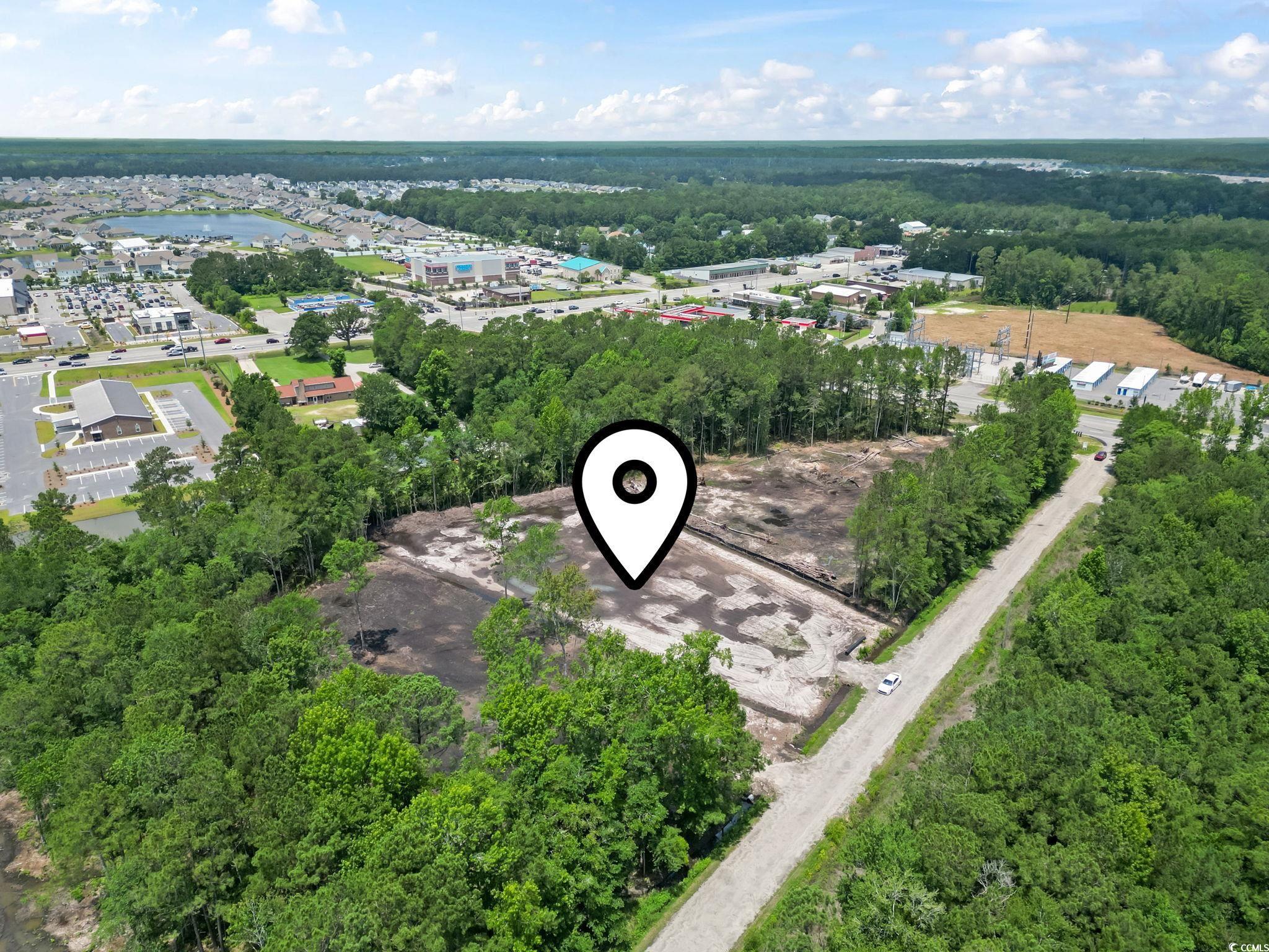 116 Dave Carr Court Myrtle Beach, SC 29588 - Photo 8 of 9 Aerial view of a heavily wooded area