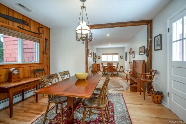 a kitchen with stainless steel appliances granite countertop a sink and a refrigerator