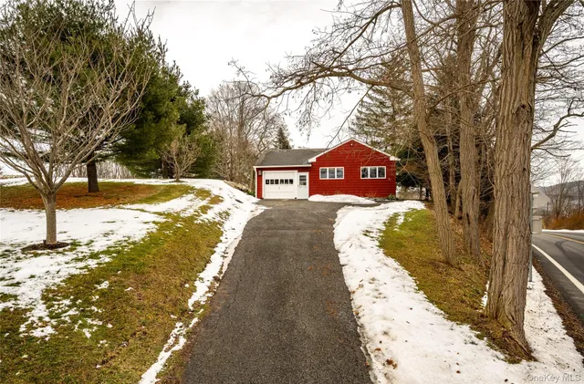 a sign board with a yard