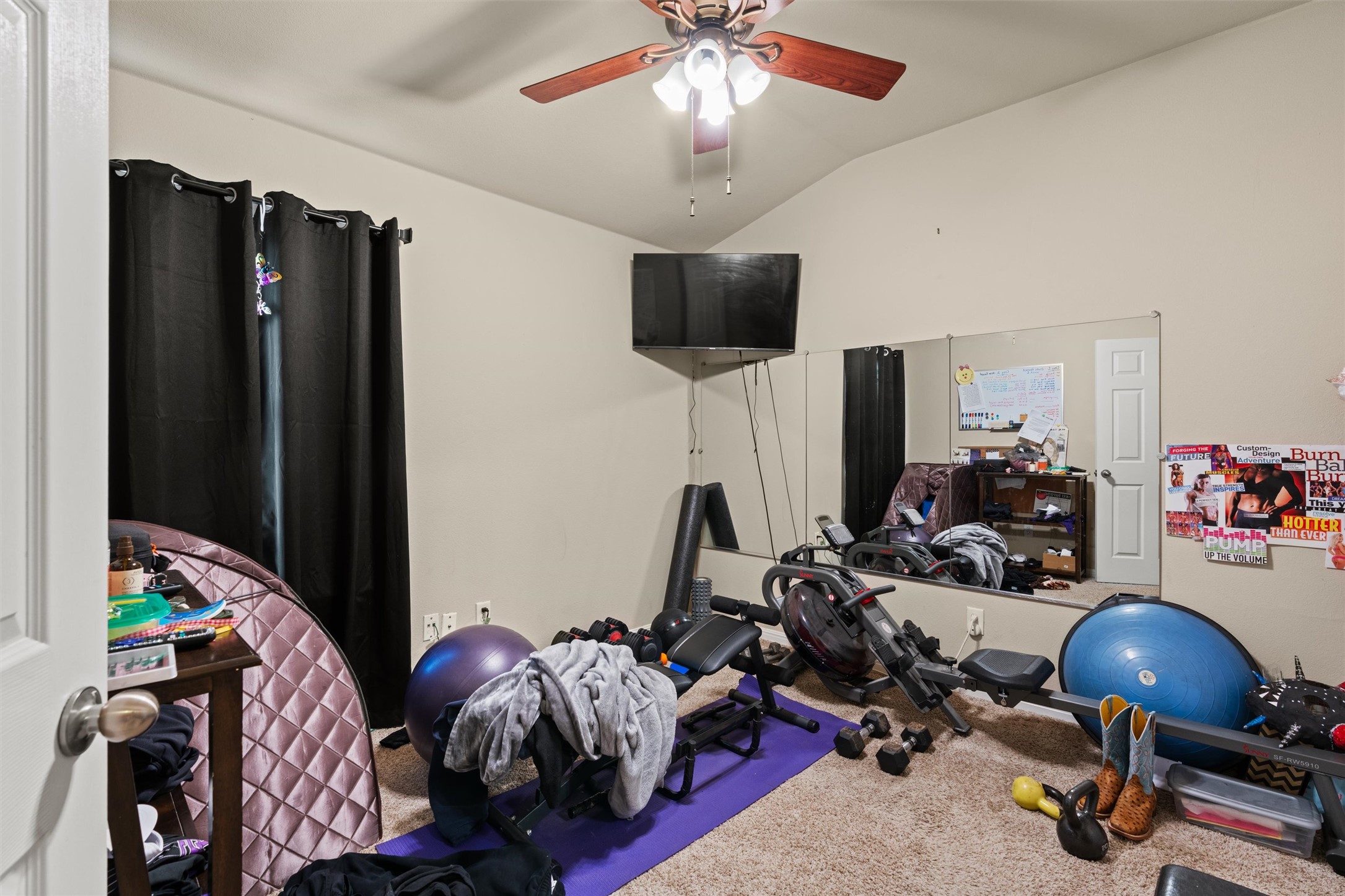 11917 Lansdowne Road Austin, TX 78754 - Photo 14 of 20 This versatile room features an airy ceiling and soft carpeting, perfect for a home gym.