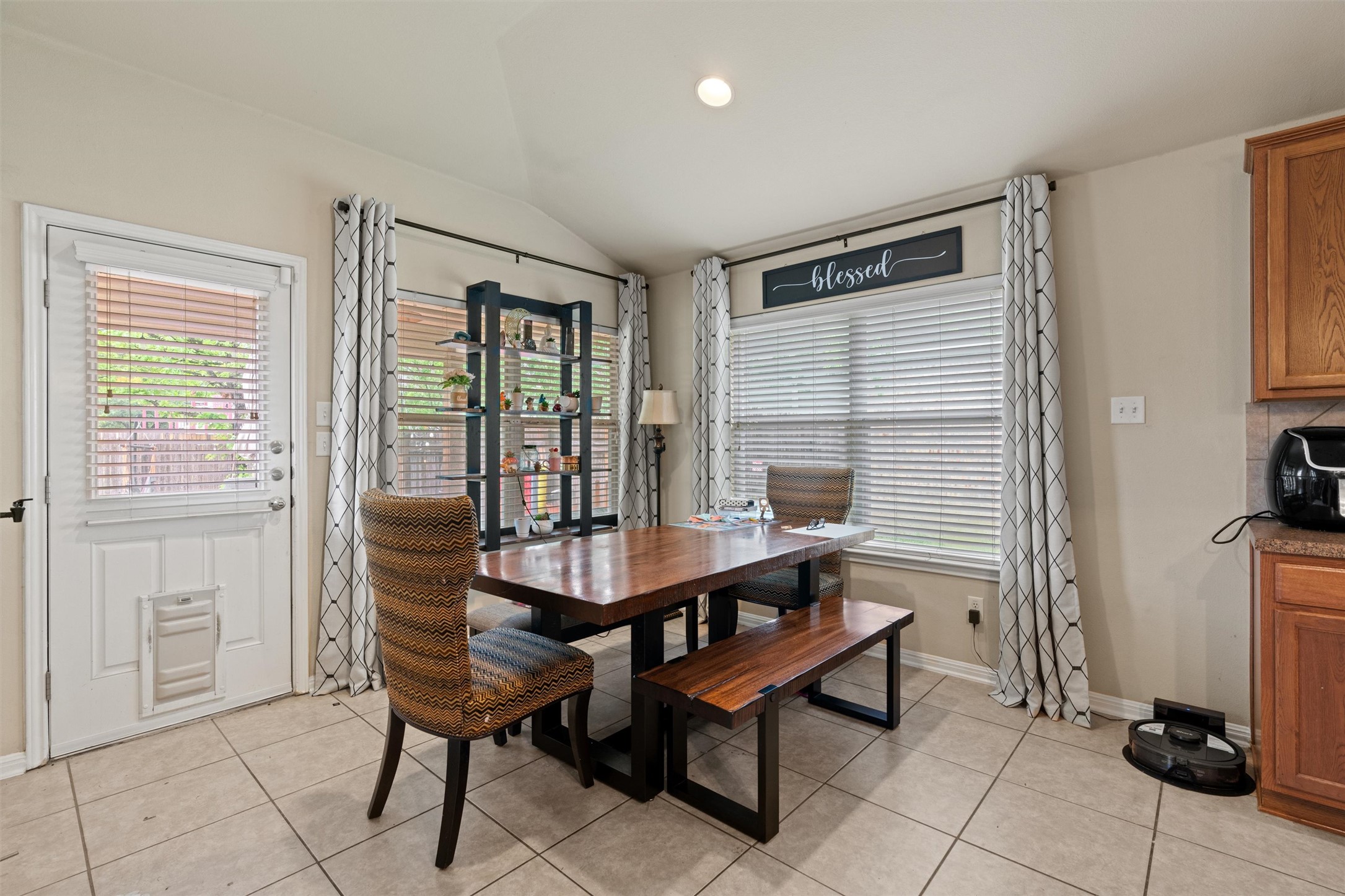 11917 Lansdowne Road Austin, TX 78754 - Photo 5 of 20 This bright dining area features an abundance of natural light and direct access to the outdoors.