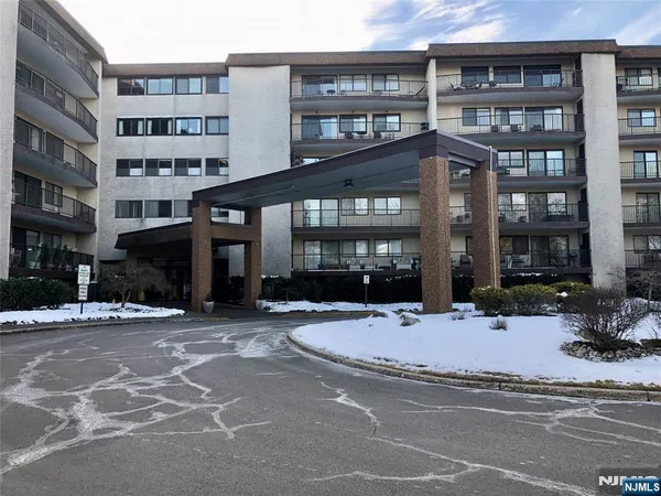 a view of a building and a street