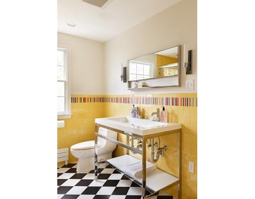 35 Louis Drive Wellesley, MA 02481 - Photo 12 of 14 a bathroom with a sink a toilet and a mirror