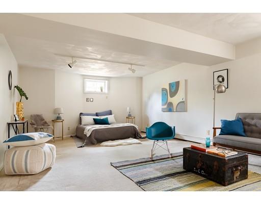 35 Louis Drive Wellesley, MA 02481 - Photo 14 of 14 a living room with furniture and a lamp