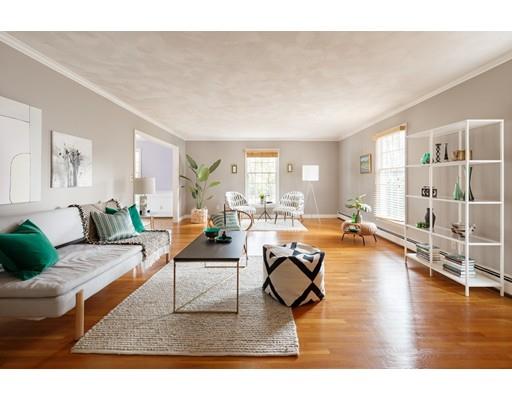 35 Louis Drive Wellesley, MA 02481 - Photo 2 of 14 a living room with furniture and a table