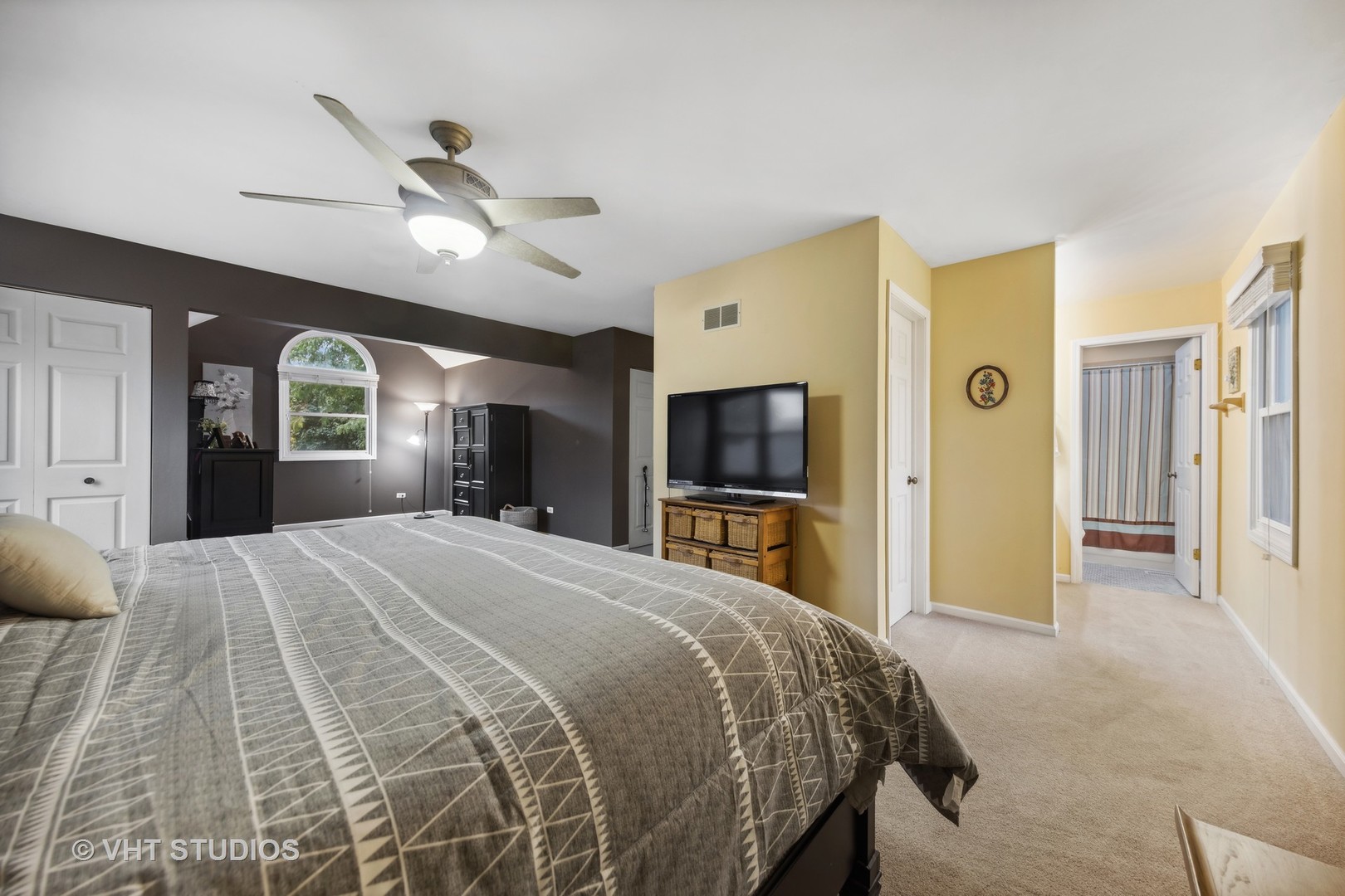 2120 Savannah Road Elgin, IL 60123 - Photo 13 of 26 a bedroom with a bed and a flat screen tv
