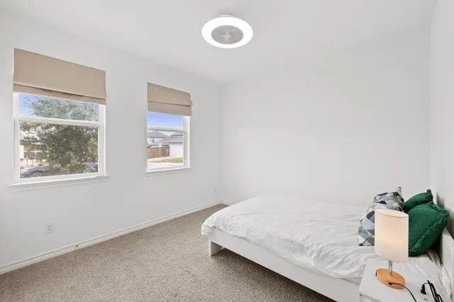 a view with a sink and chandelier