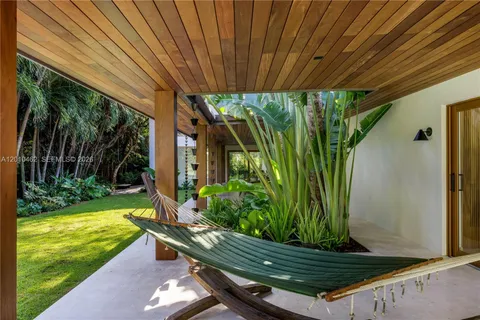a view of a house with a tree
