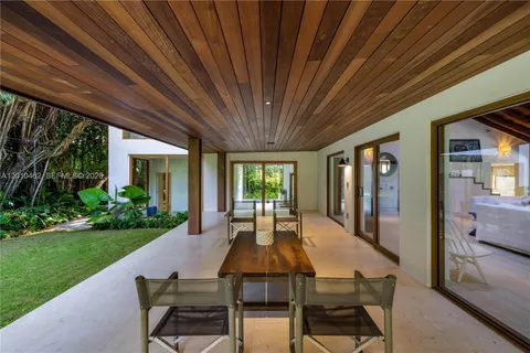 a view of yard with patio