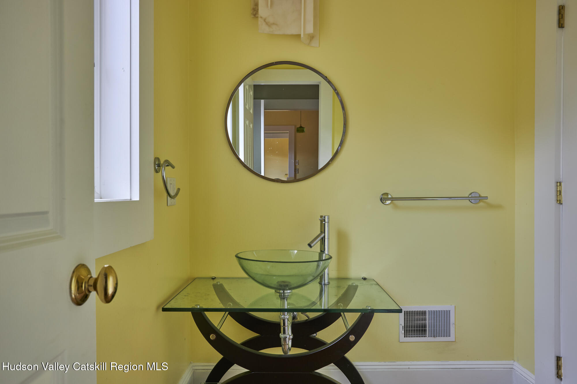 203 Silver Lake Road Rhinebeck, NY 12572 - Photo 17 of 46 a bathroom with a sink and a mirror