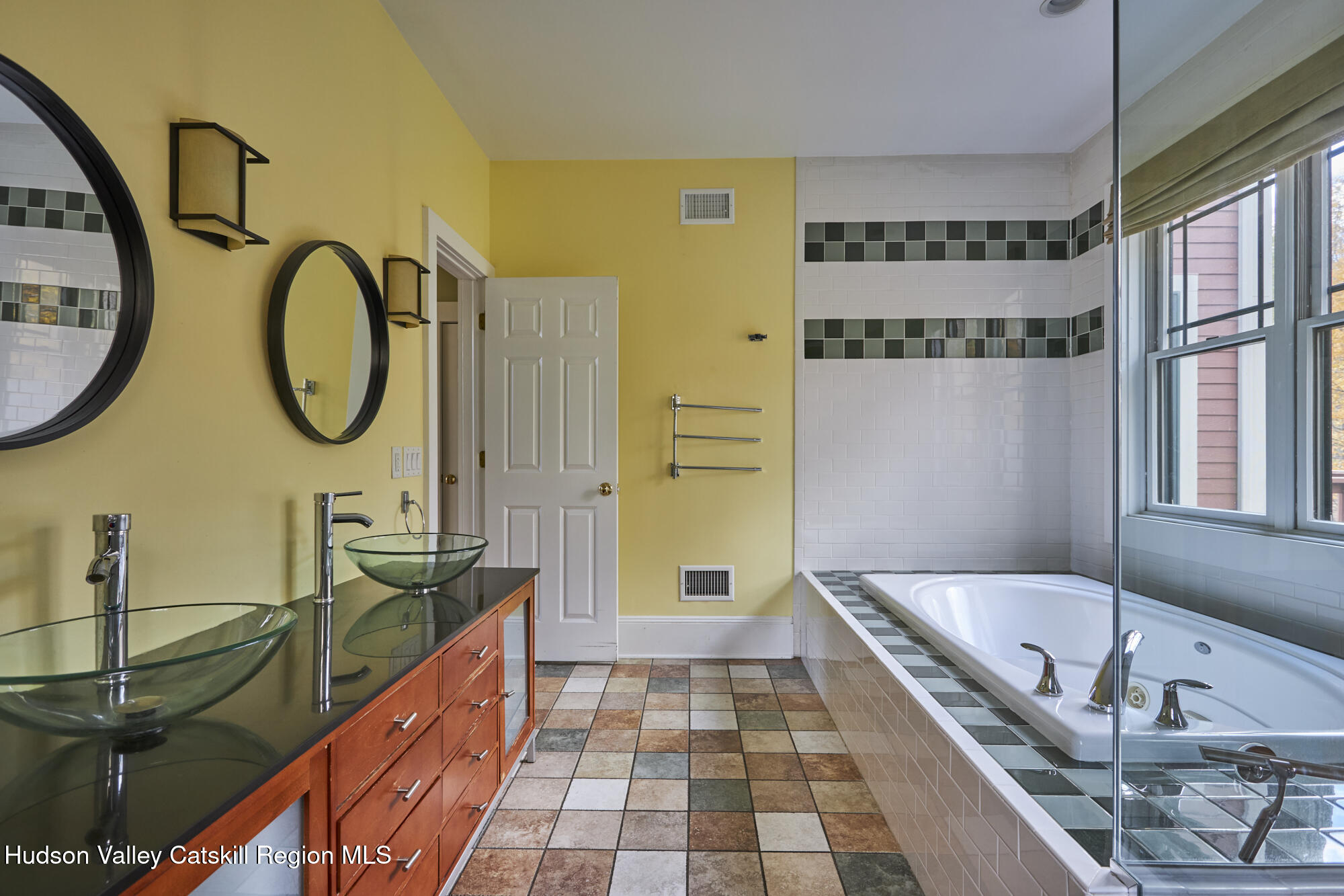 203 Silver Lake Road Rhinebeck, NY 12572 - Photo 22 of 46 a bathroom with a tub sink and mirror