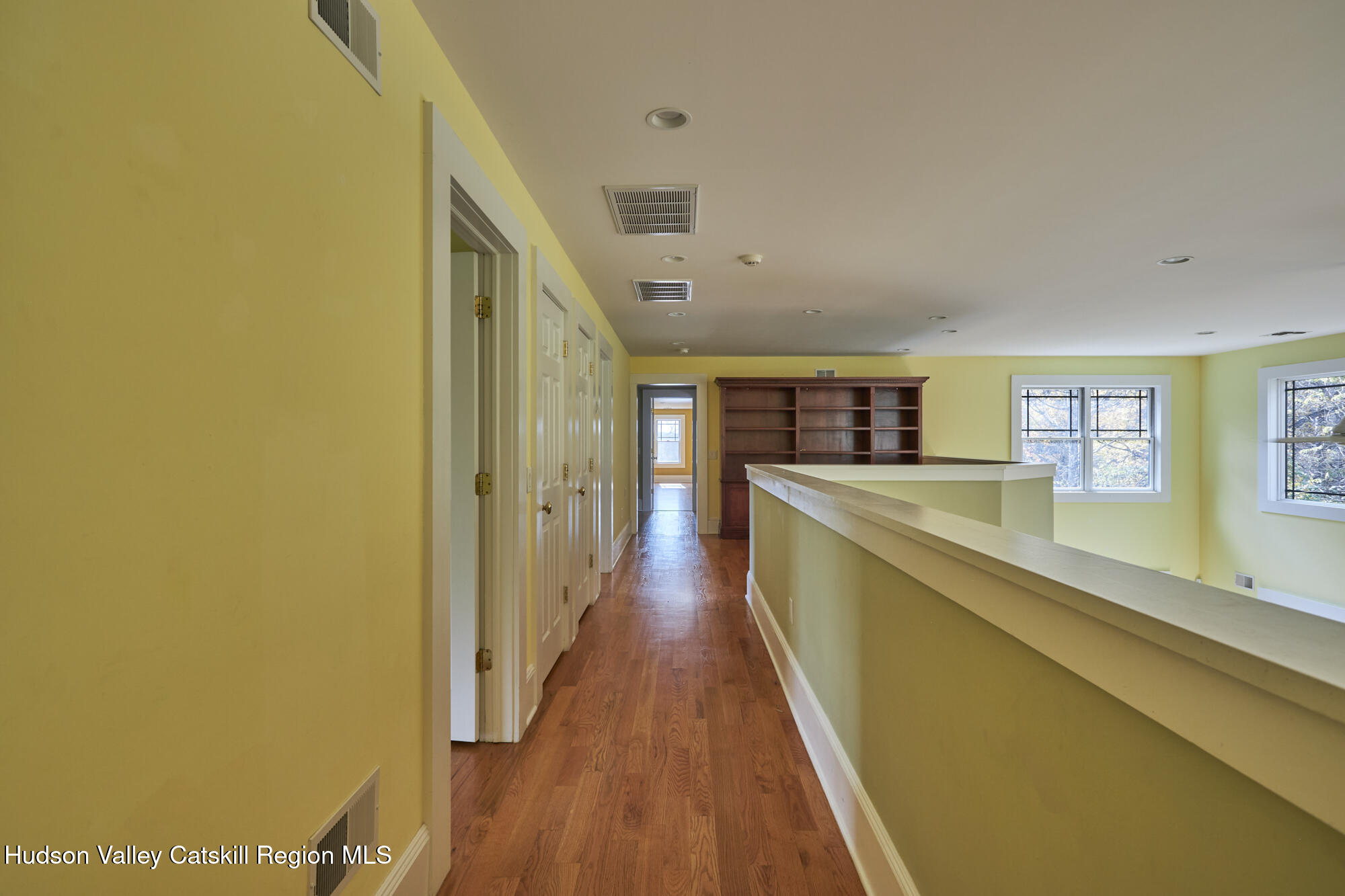 203 Silver Lake Road Rhinebeck, NY 12572 - Photo 24 of 46 a view of a kitchen with a fridge and wooden floor