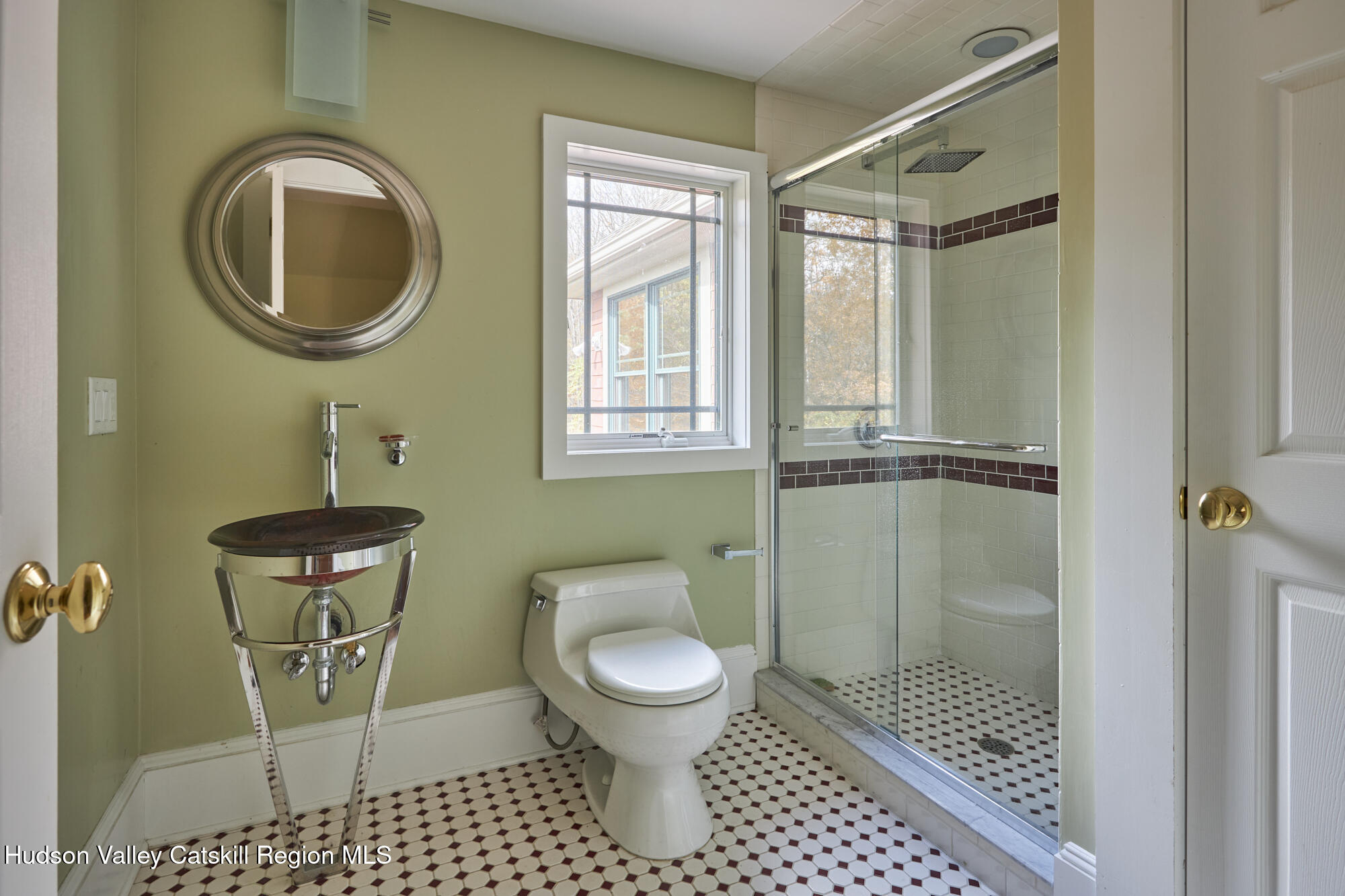203 Silver Lake Road Rhinebeck, NY 12572 - Photo 29 of 46 a bathroom with a toilet a sink and a shower