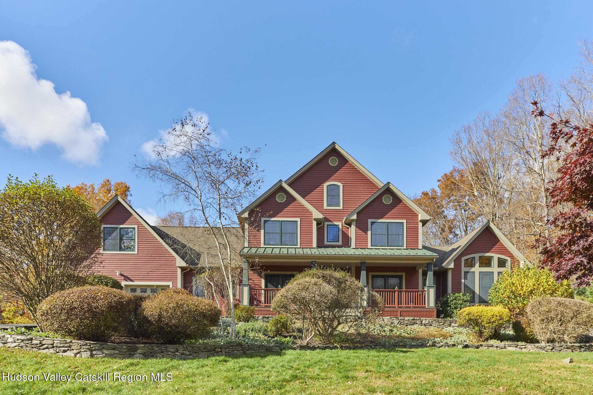 203 Silver Lake Road Rhinebeck, NY 12572 - Photo 35 of 46 a front view of a house with garden