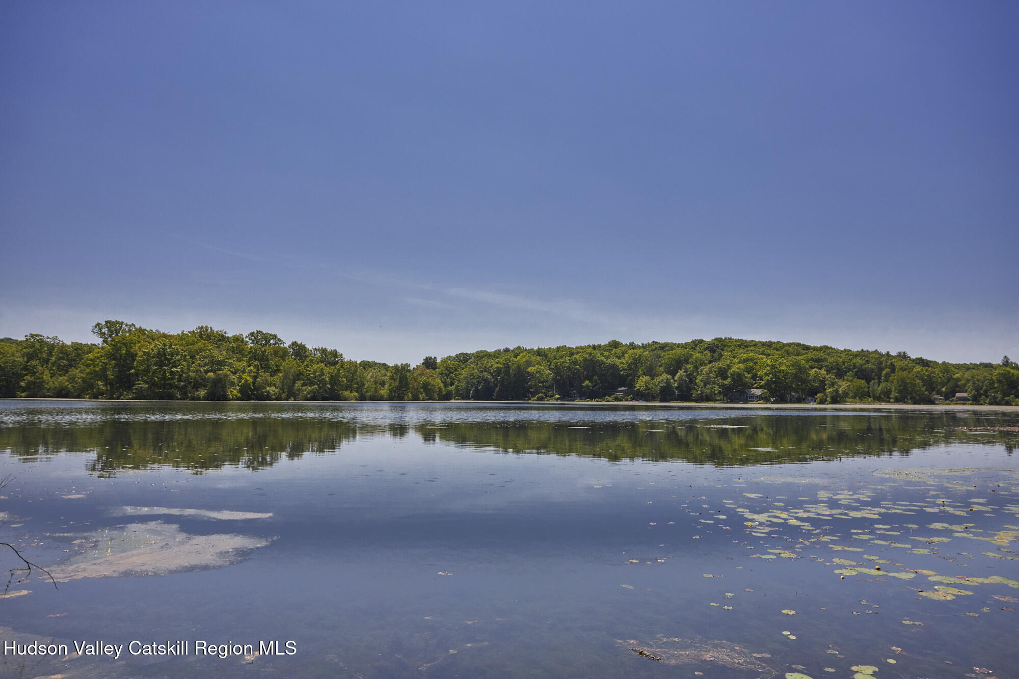 203 Silver Lake Road Rhinebeck, NY 12572 - Photo 4 of 46 a view of a lake with houses in the back
