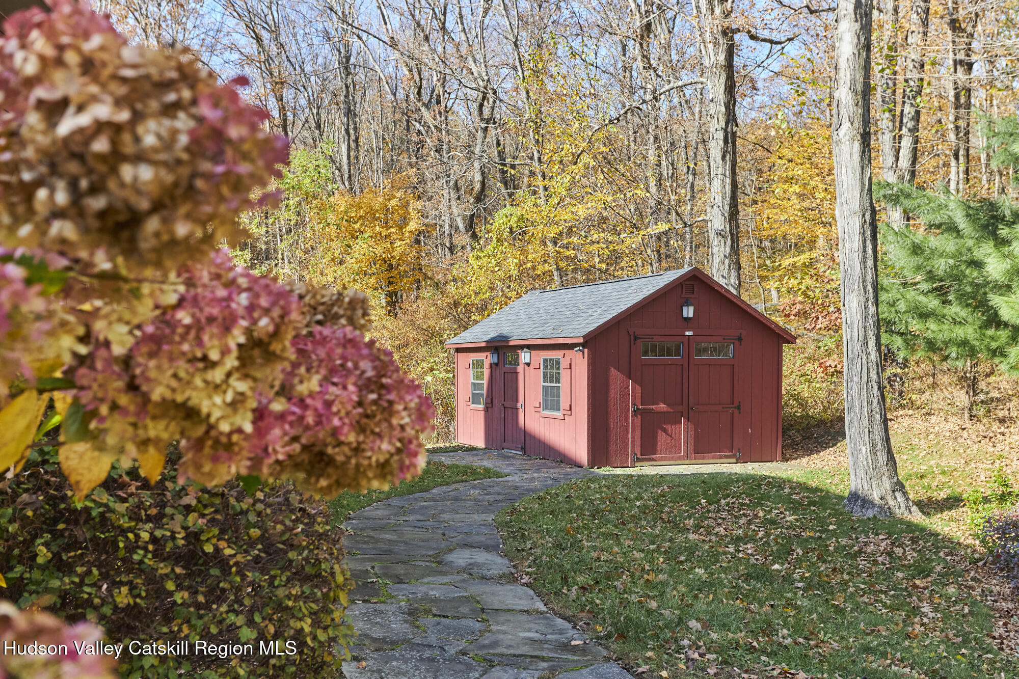 203 Silver Lake Road Rhinebeck, NY 12572 - Photo 6 of 46 a view of a brick house with a yard
