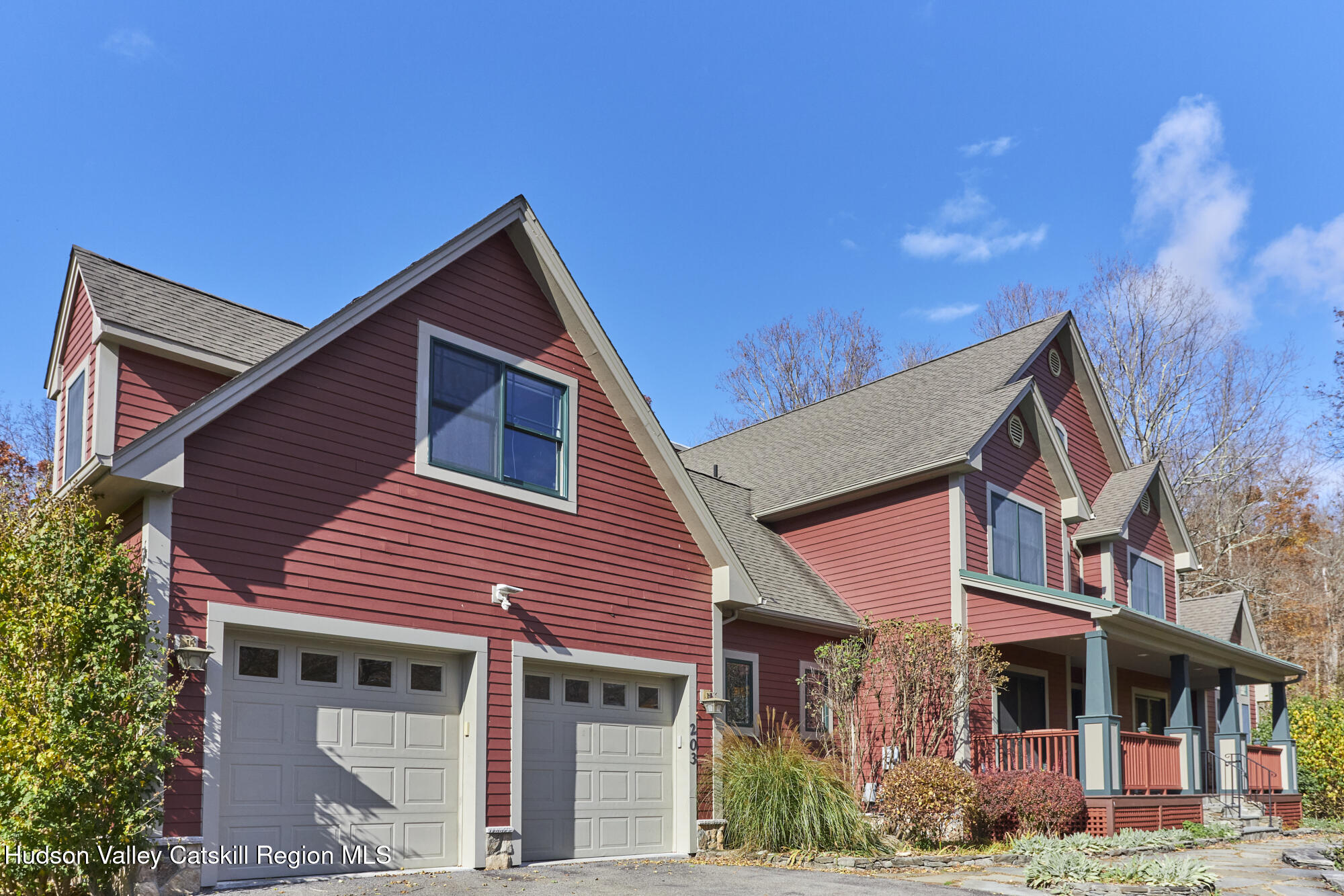 203 Silver Lake Road Rhinebeck, NY 12572 - Photo 7 of 46 a front view of a house with garden
