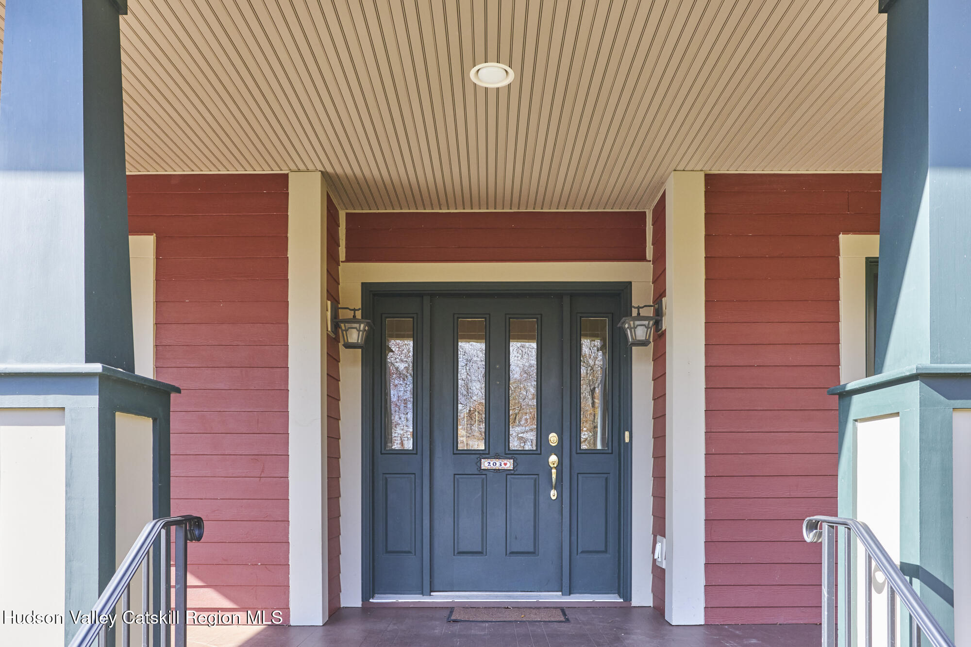 203 Silver Lake Road Rhinebeck, NY 12572 - Photo 9 of 46 a front view of a building with glass door
