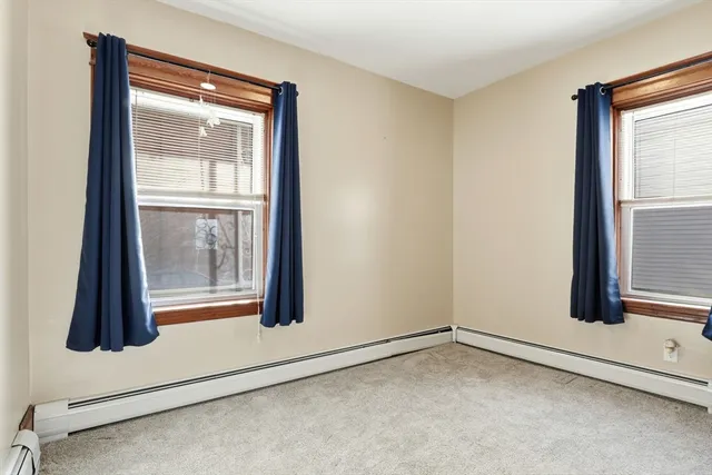 an empty room with window