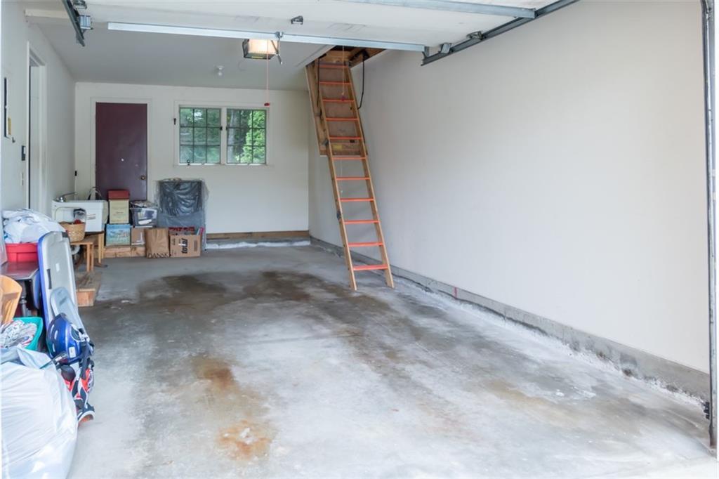 27 Birch Meadow Road, Unit M2 Brunswick, ME 04011 - Photo 28 of 35 One-car garage has extra storage...