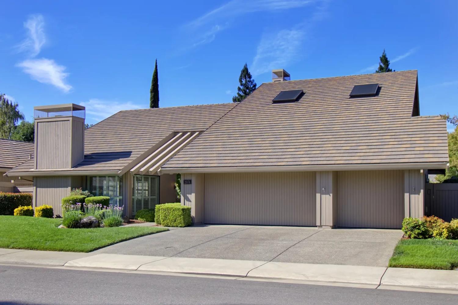 2074 Granite Bar Way Gold River, CA 95670 - Photo 1 of 1 a view of a house with a yard and potted plants