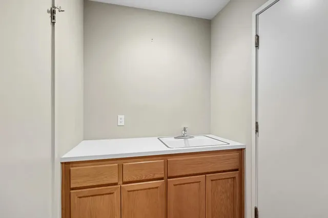 a view of a room with large windows