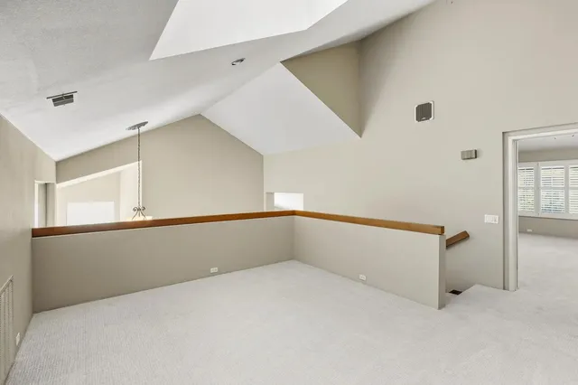 a view of a room with a flat screen tv