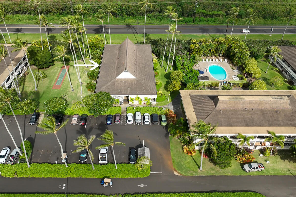 525 Aleka Loop, Unit E3 Kapaa, HI 96746 - Photo 19 of 23 an aerial view of a house with a garden and outdoor seating