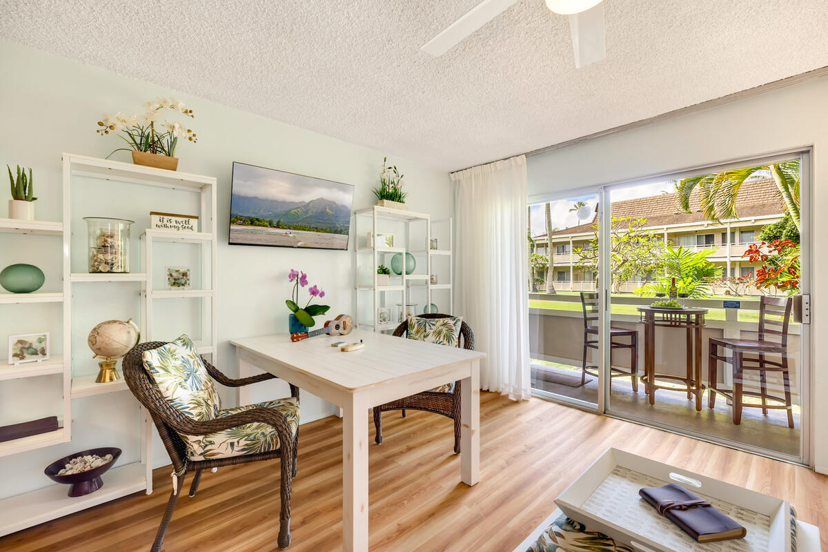 525 Aleka Loop, Unit E3 Kapaa, HI 96746 - Photo 6 of 23 a view of a dining room with furniture window and outside view