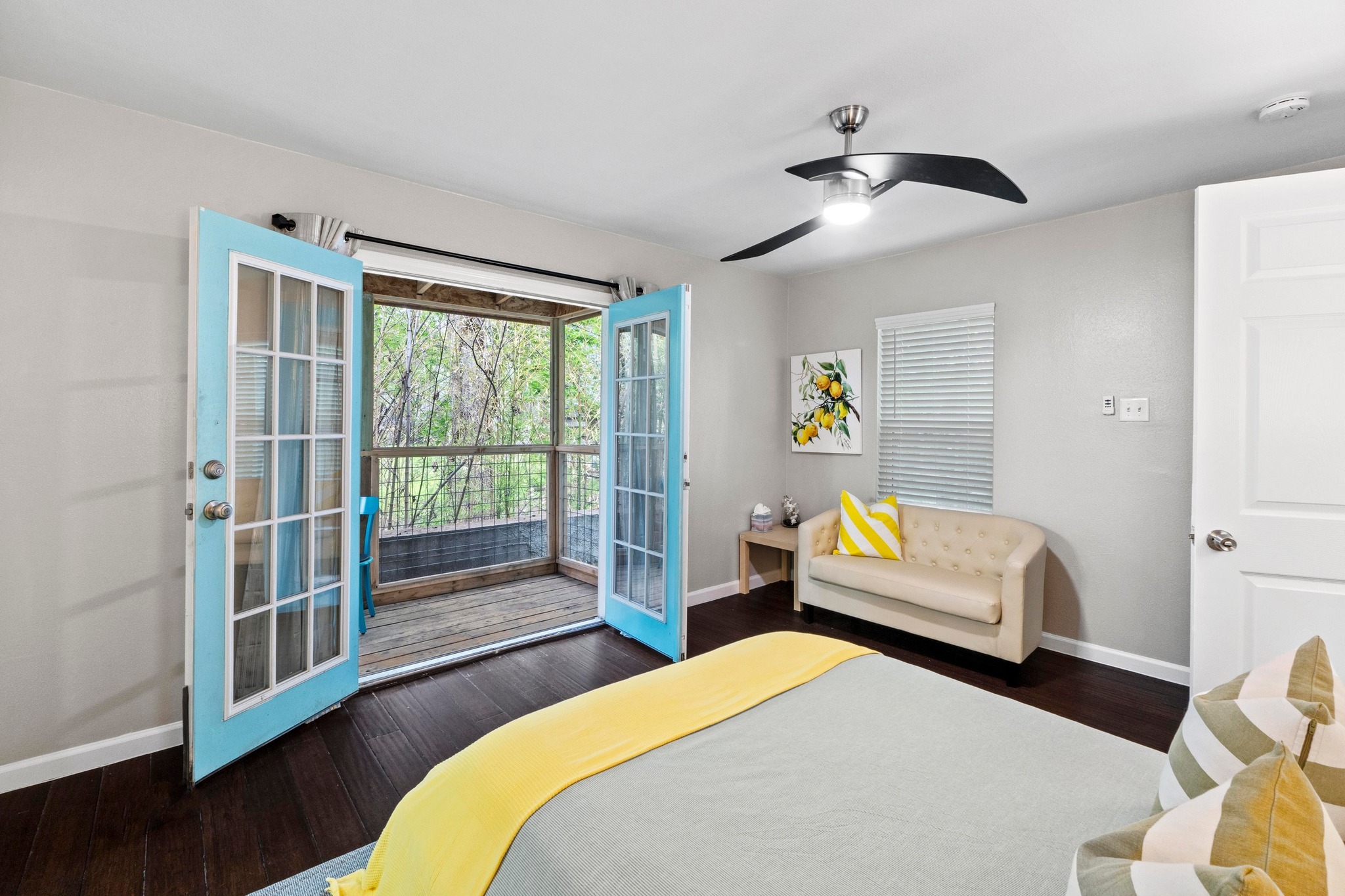 4512 Speedway, Unit A Austin, TX 78751 - Photo 23 of 39 a bedroom with a bed and wooden floor