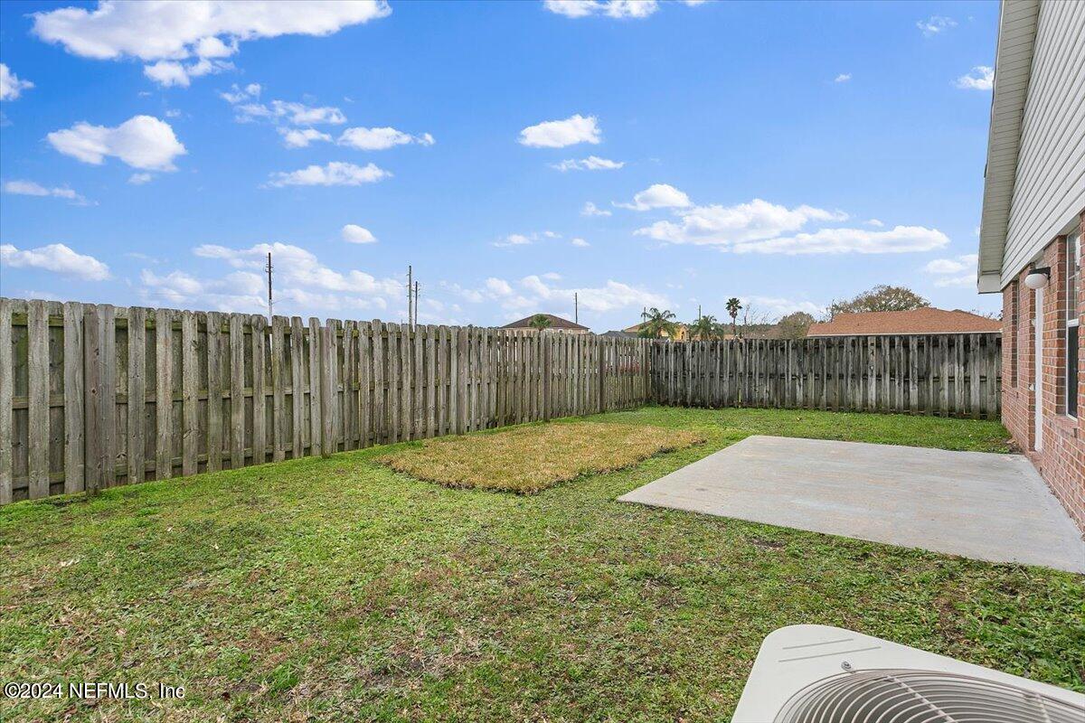 7133 High Bluff Road Jacksonville, FL 32244 - Photo 16 of 17 a view of a backyard