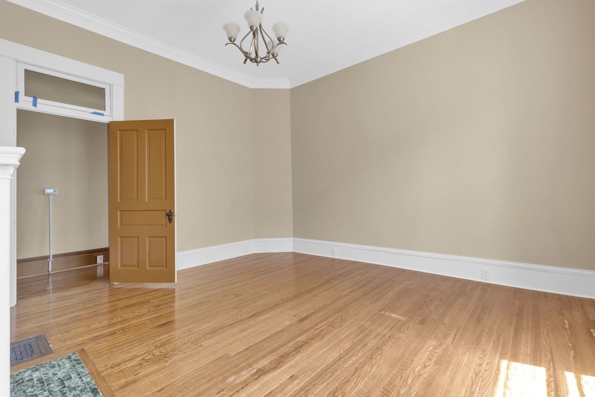 115 North Main Street Springfield, TN 37172 - Photo 16 of 24 wooden floor in an empty room with a window