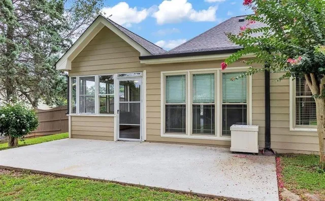 a house view with a garden space