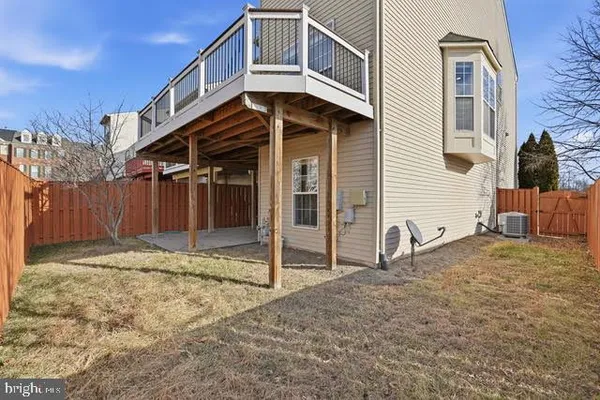 a house with trees in the background