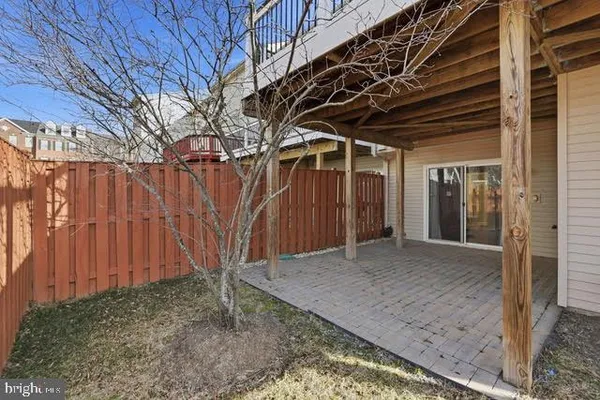 a view of a backyard of the house