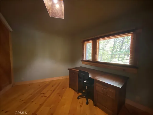 a living room with furniture and a gate