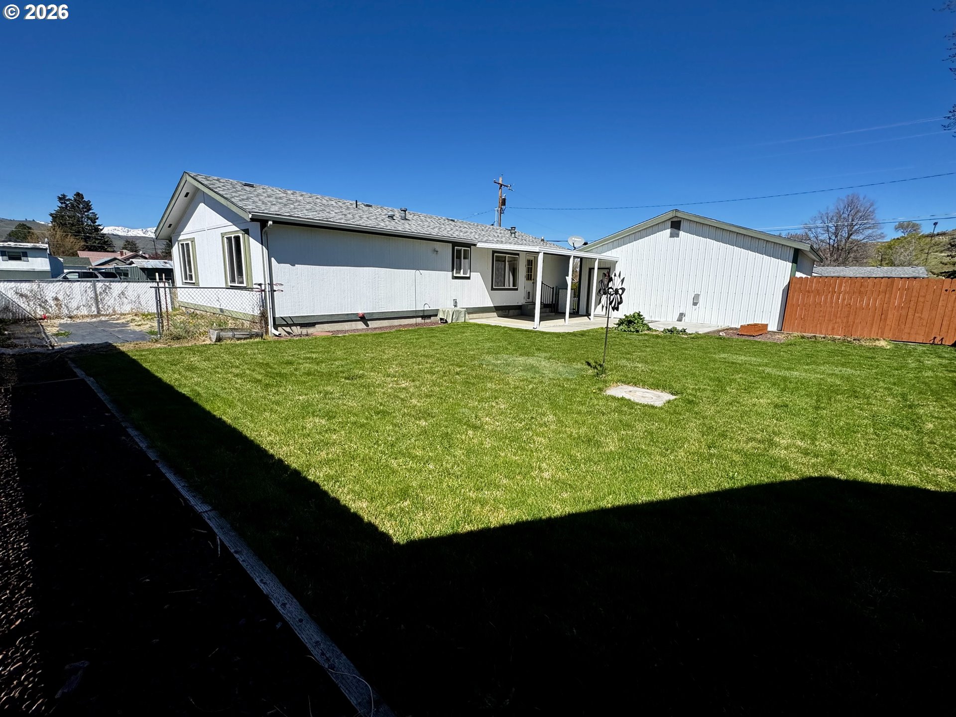 1070 Grove Street Baker City, OR 97814 - Photo 20 of 30 a view of a back yard of the house