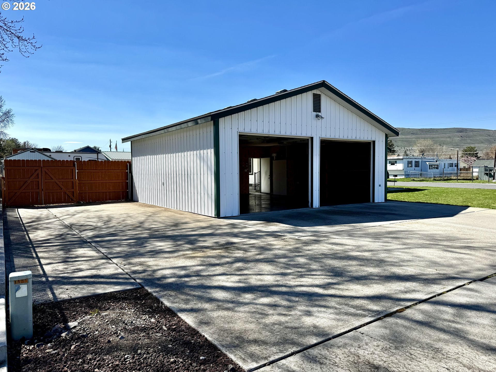 1070 Grove Street Baker City, OR 97814 - Photo 22 of 30 a view of a backyard of a house