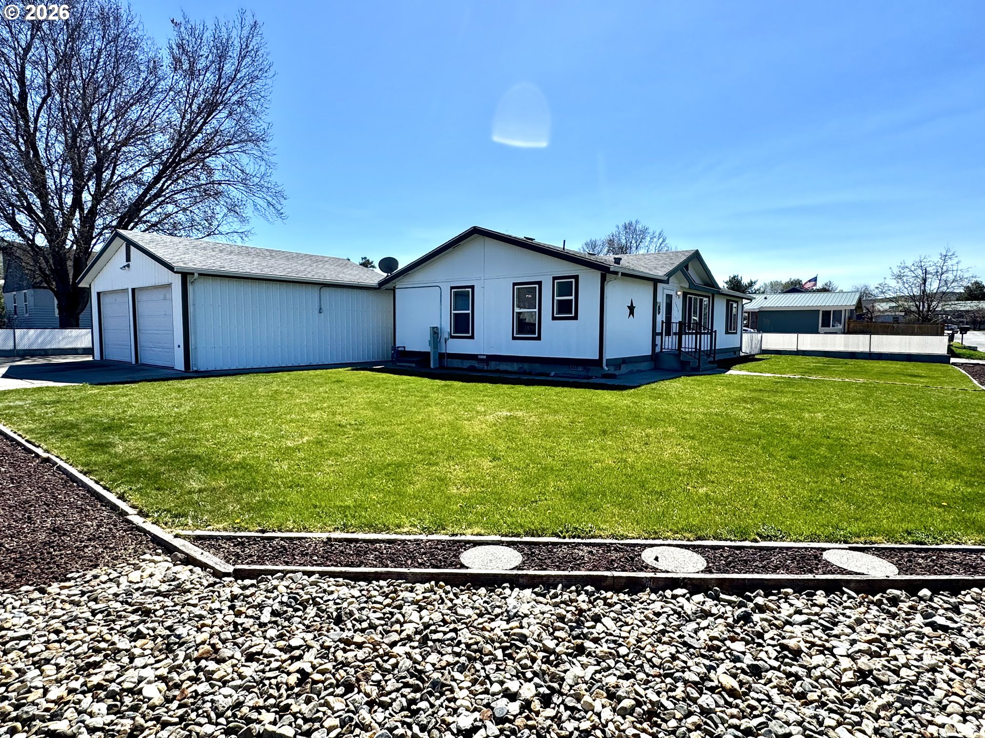 1070 Grove Street Baker City, OR 97814 - Photo 28 of 30 a view of a house with a yard