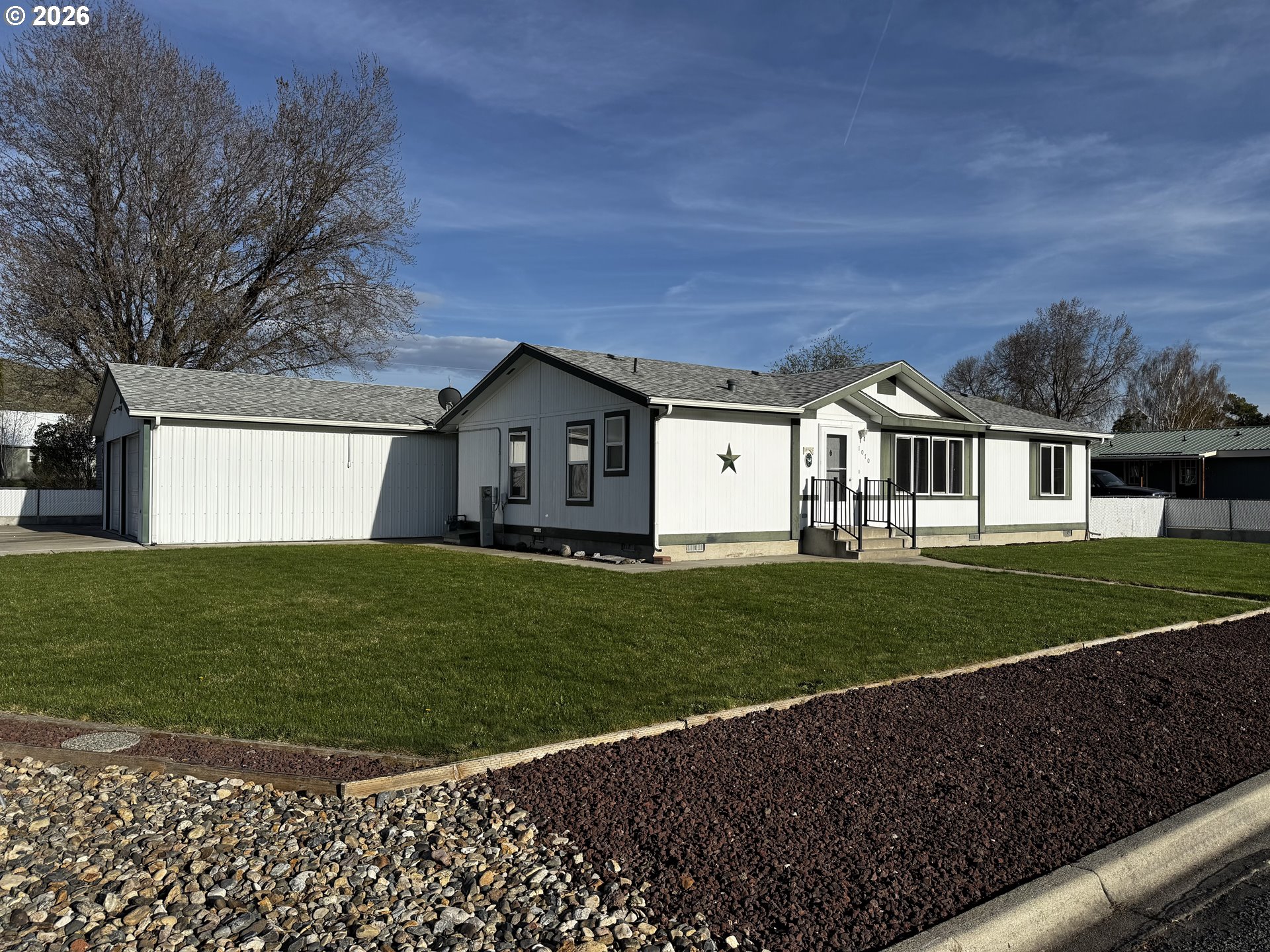 1070 Grove Street Baker City, OR 97814 - Photo 30 of 30 a view of a house with a backyard