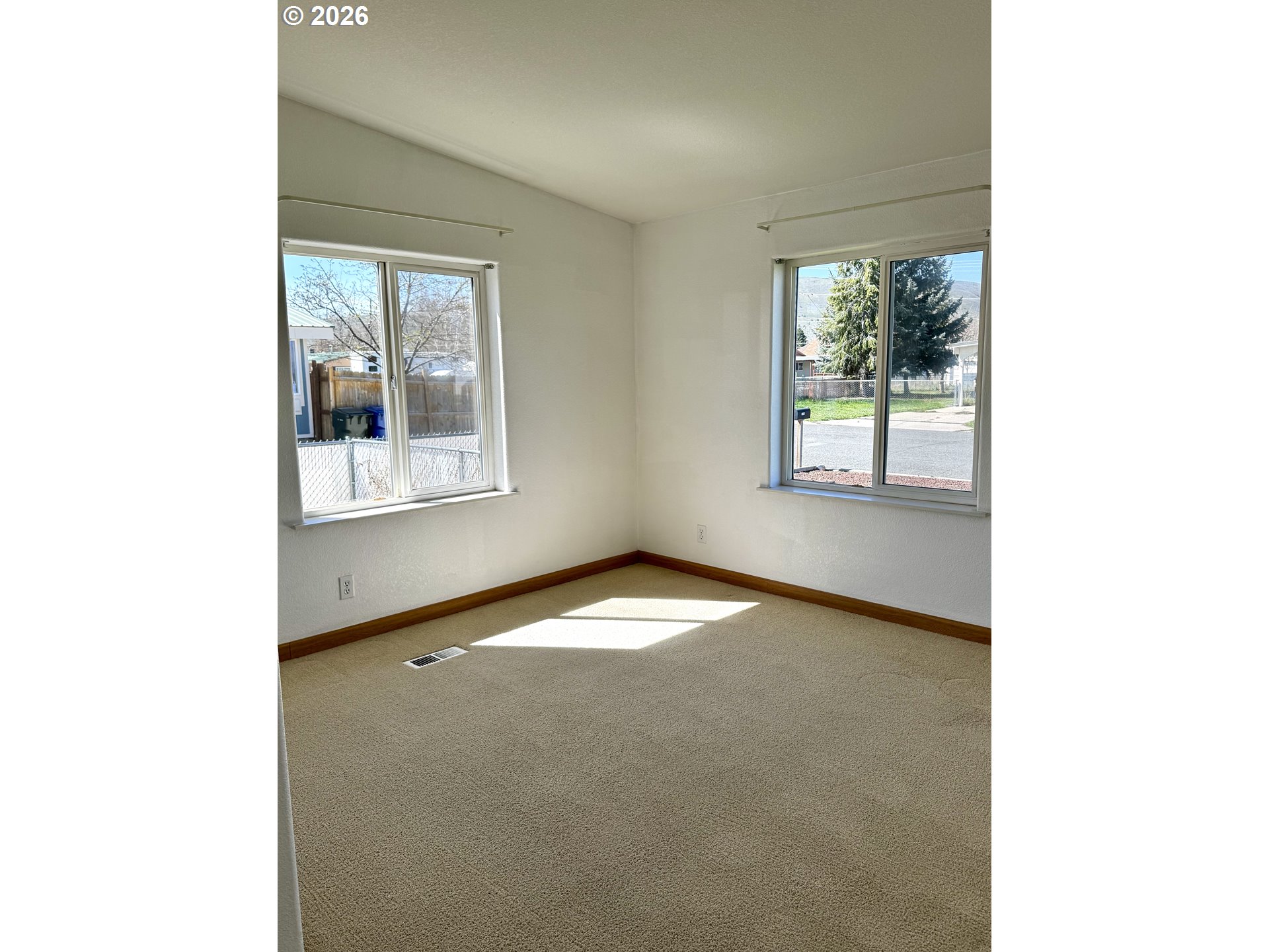 1070 Grove Street Baker City, OR 97814 - Photo 7 of 30 a view of an empty room with a window