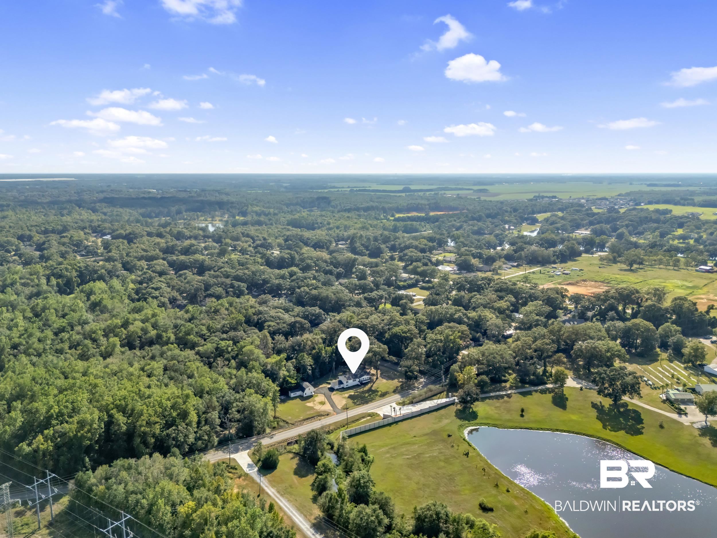 8351 Theodore Dawes Road Theodore, AL 36582 - Photo 42 of 46 Bird's eye view of a large body of water